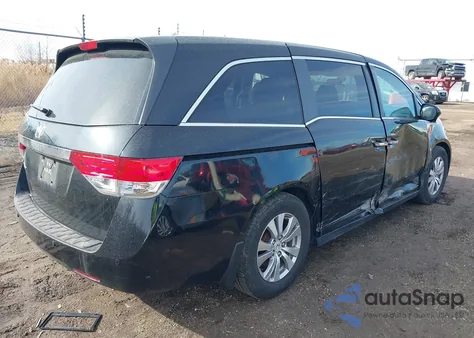 2014 Honda Odyssey Ex z USA, uszkodzony, nr VIN 5FNRL5H4XEB047273